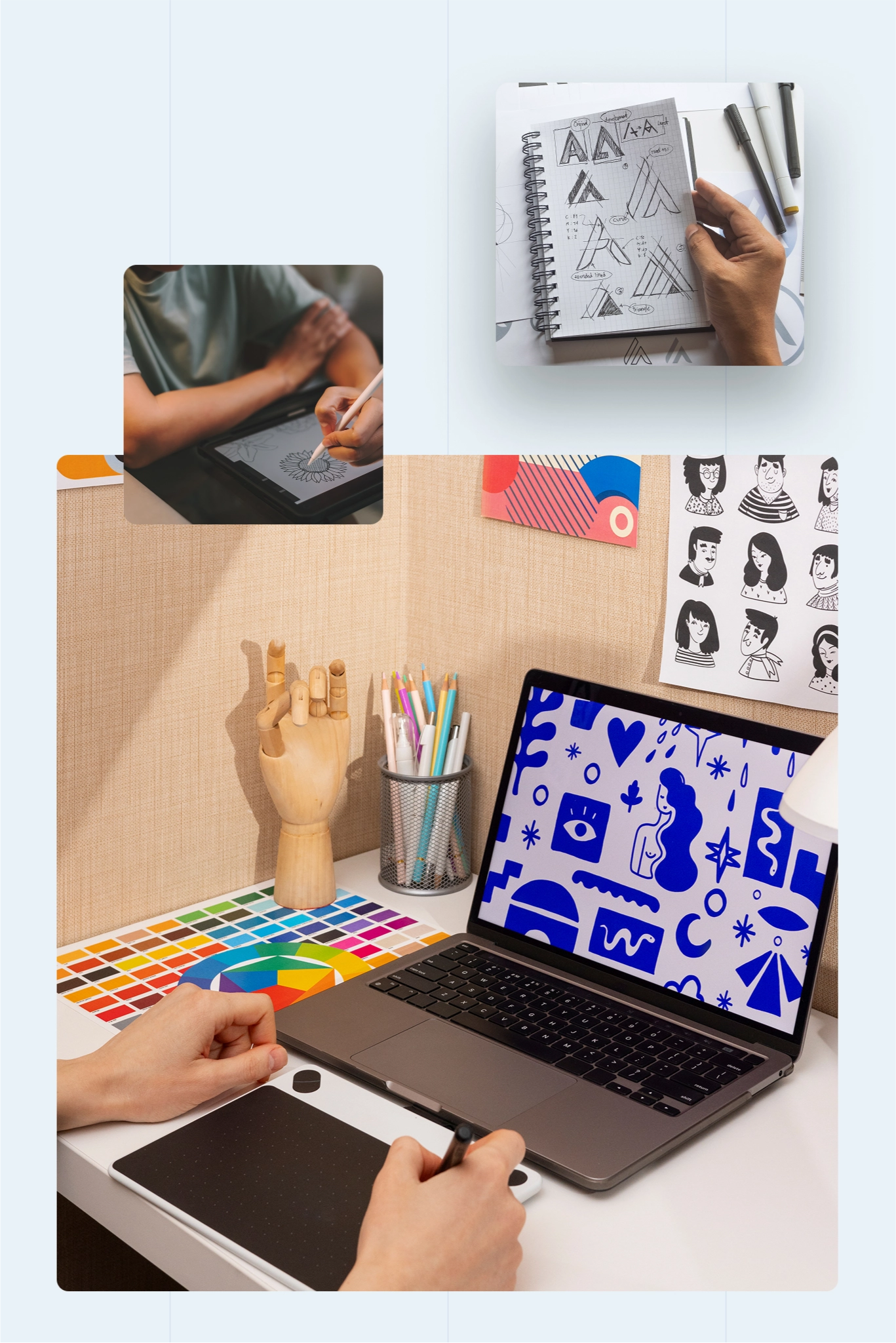 A designer works on geometric sketches with pen and tablet. Nearby are colored pencils, a wooden hand model, and a laptop displaying abstract blue art.